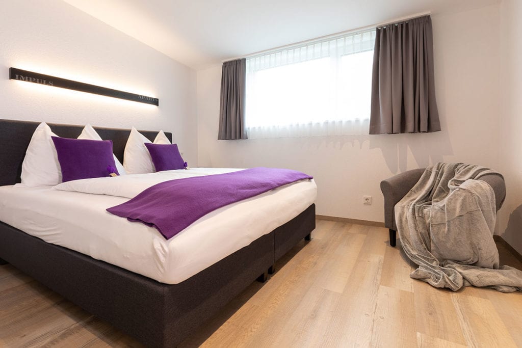 Schlafzimmer - ImPuls aparts, moderne Appartements in Schladming
